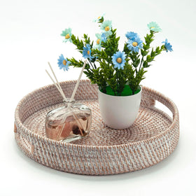 Ximisise rattan tray showing coffee and dessert service on a table.