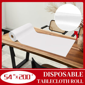 Xnluothsk white plastic tablecloth unrolled to cover long party tables.