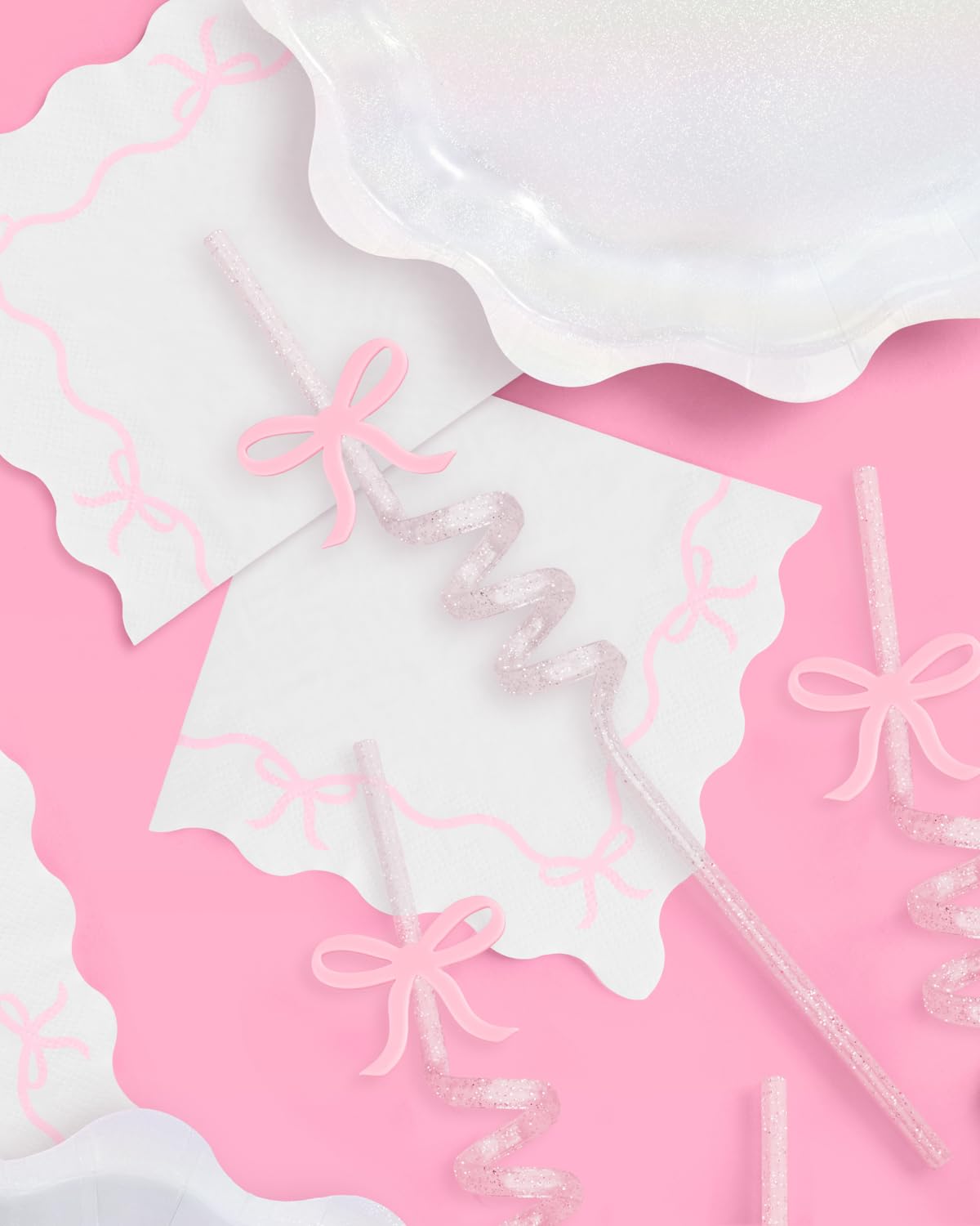 Ten-inch pink bow straw featuring removable charm for customizable decor