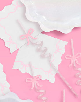 Ten-inch pink bow straw featuring removable charm for customizable decor