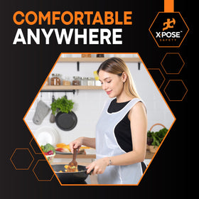 Xpose Safety 300 white disposable apron in painting scene during craft projects.