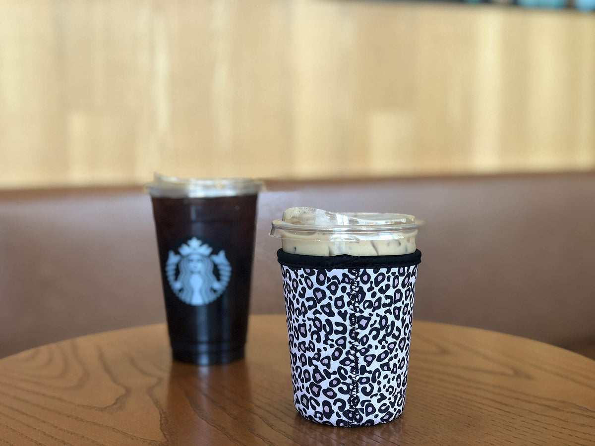 Xumbtvs leopard print close-up shows neoprene texture and flexible stretch for various beverages.
