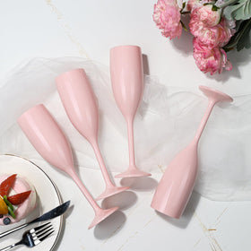 XUWAIDSGN wedding table setup with light pink plastic flutes.