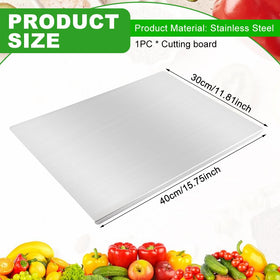 XuYelora cutting board with lip maintains stability and catches liquids during prep.