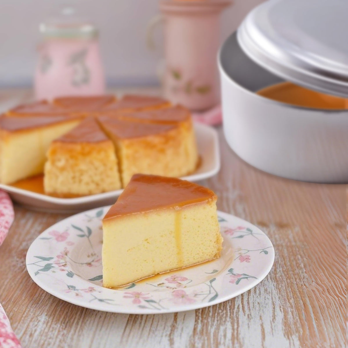 Xylarnoveth aluminum flan mold for even heat and smooth texture.