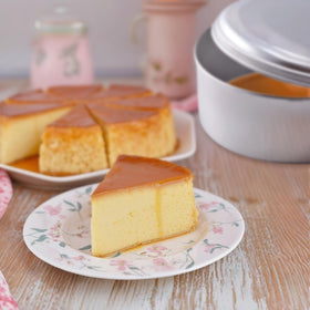 Xylarnoveth aluminum flan mold for even heat and smooth texture.