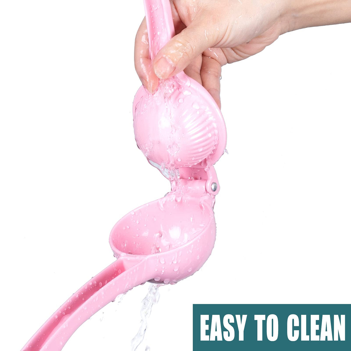 Y-Me ergonomic pink juicer highlights comfortable daily squeezing.