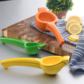 Y-Me yellow citrus press adds cheerful color to daily kitchen prep.