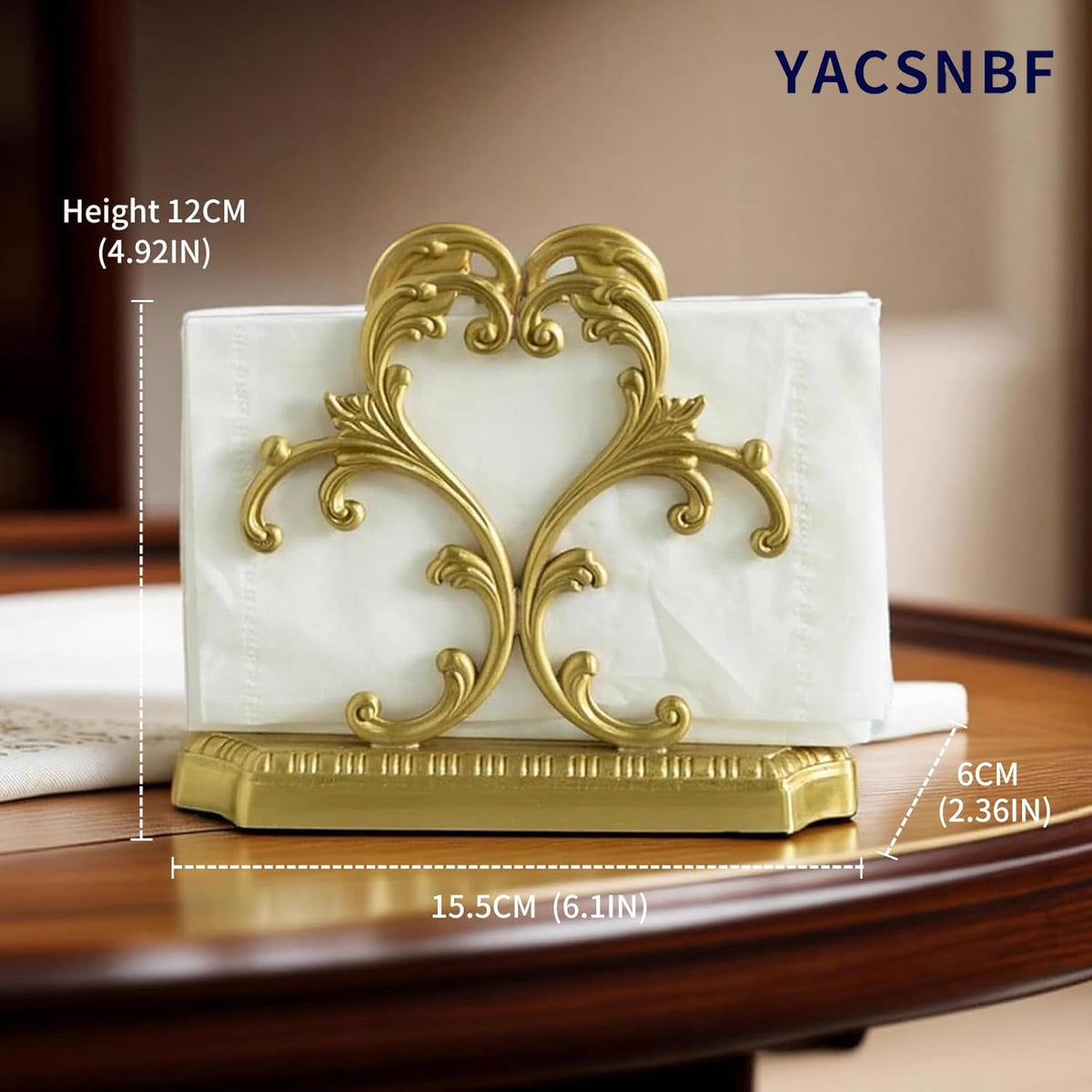 Gold brass napkin holder keeps napkins easily accessible on tabletop