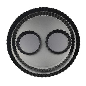 Yamteck 11-inch tart pan with removable bottom for easy demolding and clean presentation.