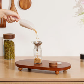 Acacia wood lid texture adds natural warmth to the kitchen.