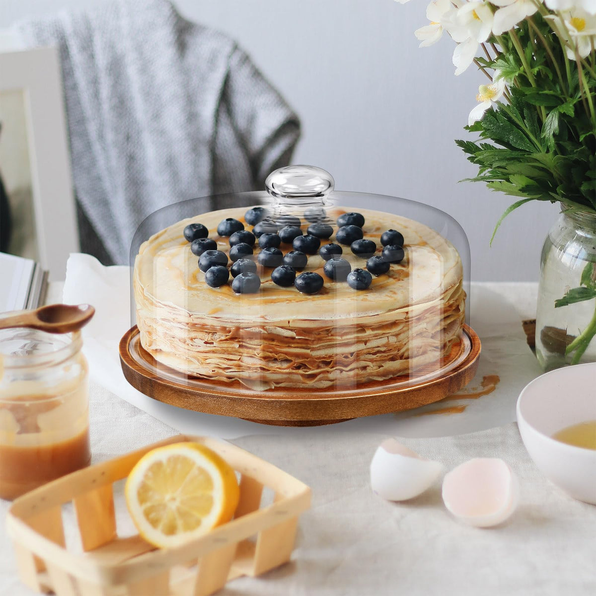 Yangbaga 11in diameter accommodates most 8-10 inch cakes.