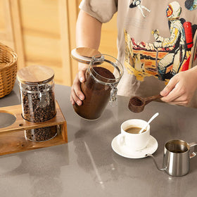 Yangbaga wooden spoon and stand add convenient scooping and decor.