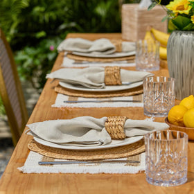 YANGQIHOME dining setup with boho placemats for natural table decor.