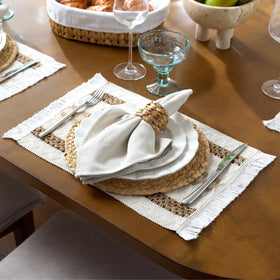 YANGQIHOME round placemats offering circular focal point and tabletop protection.