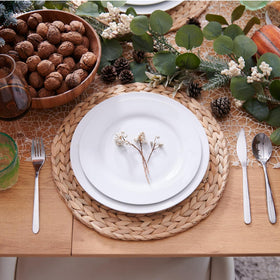 Holiday Christmas table setup using placemats for festive ambiance