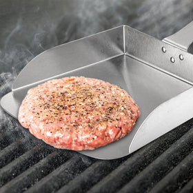 Yarlung griddle scraper in action smoothly shifts fried rice