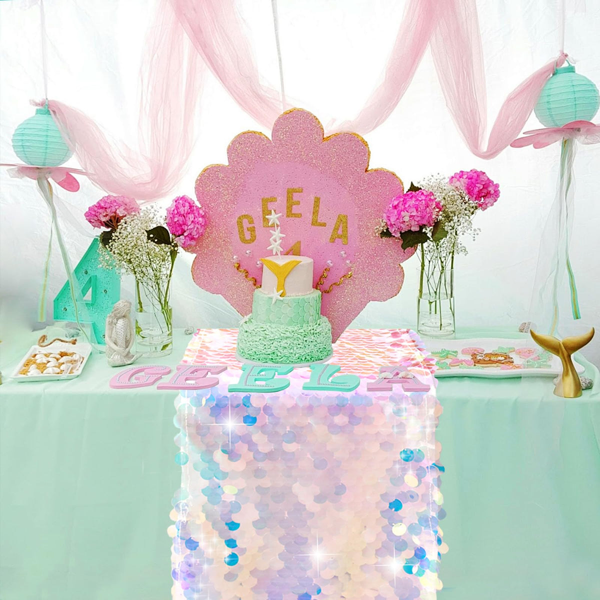 Yblut sequined runner enhances wedding or baby shower tables with glittery mermaid scales.