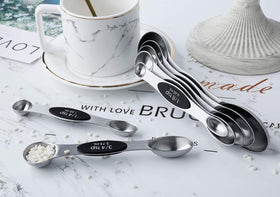 Slim end fits narrow spice jars while the rounded bowl handles liquids smoothly with YellRin
