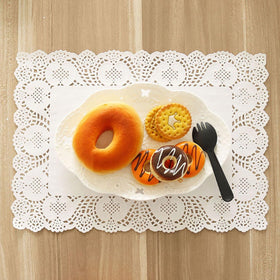 YESON lace paper doilies hollow-out pattern elevates cake and dessert displays.