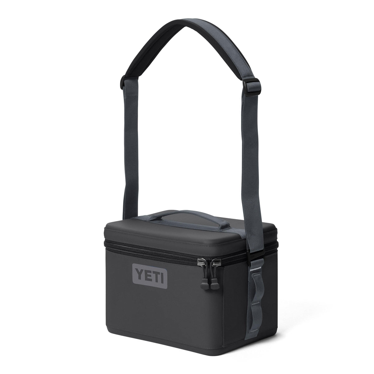 YETI Daytrip 9L Charcoal with adjustable shoulder strap for hands-free transport.