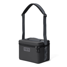 YETI Daytrip 9L Charcoal with adjustable shoulder strap for hands-free transport.