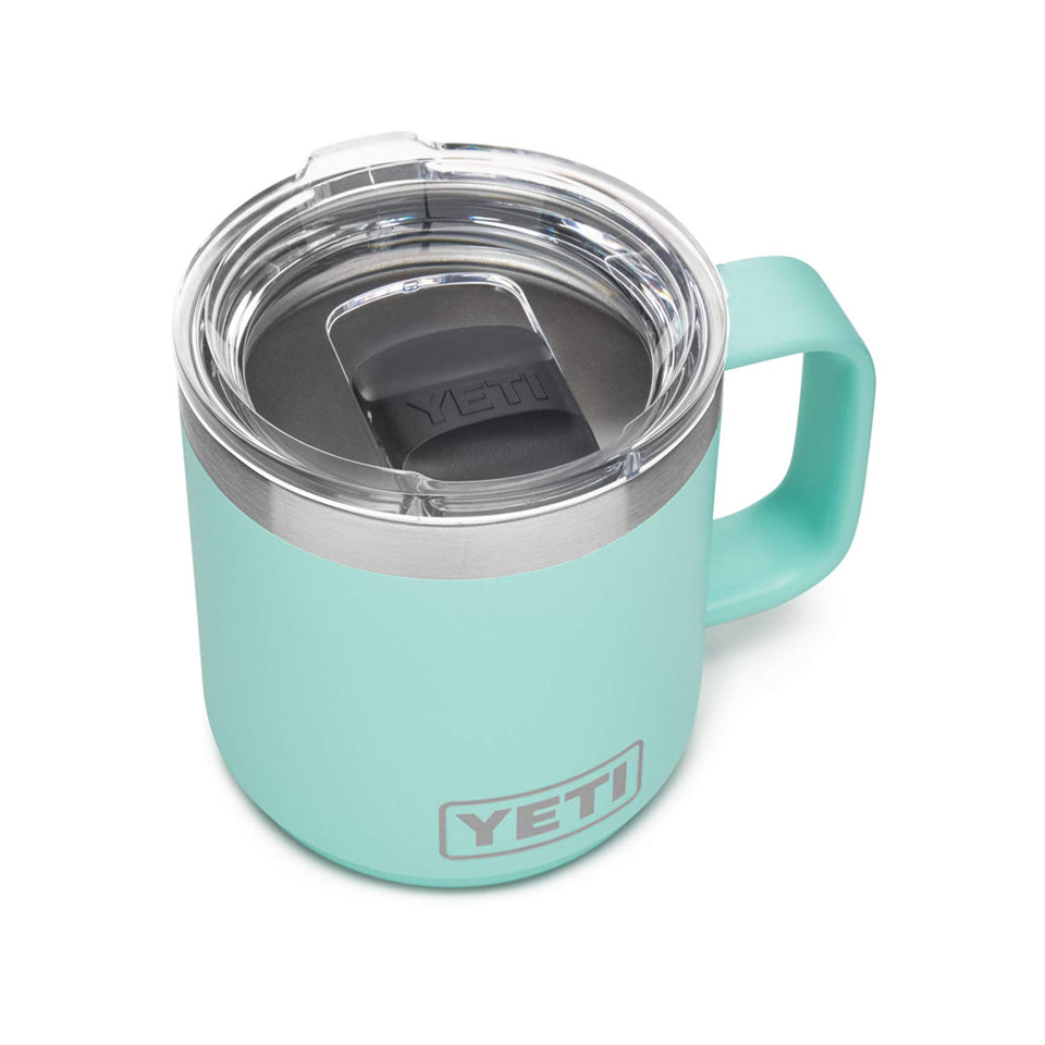 YETI Rambler 10 oz Stackable Mug in seafoam, ideal for outdoor coffee moments.