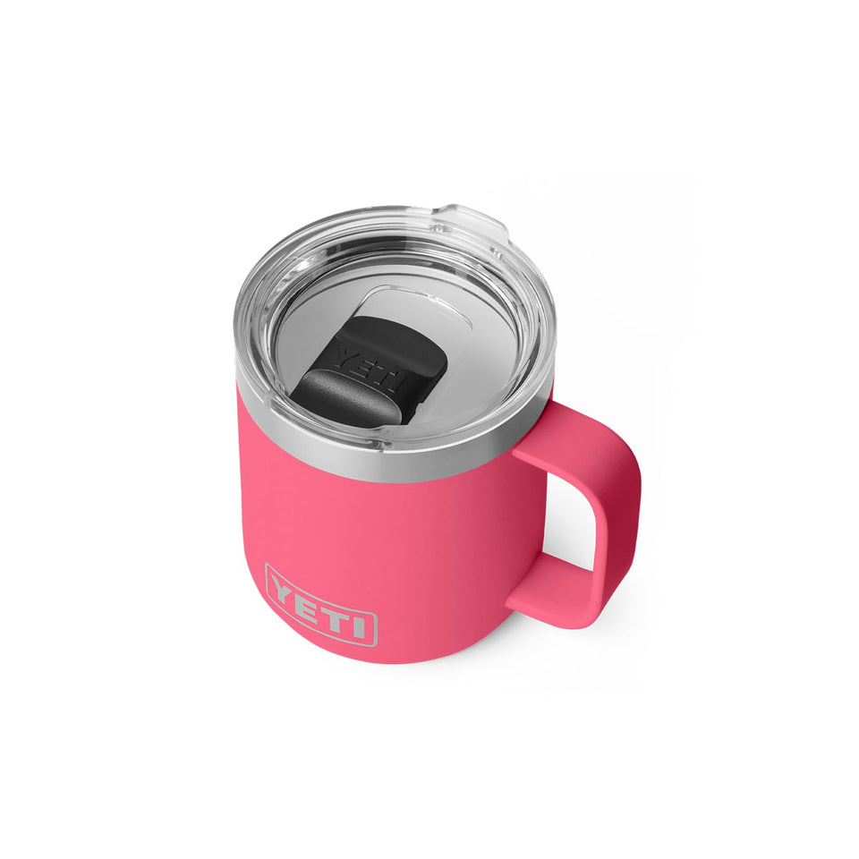 YETI Rambler 10 oz ceramic-lined mug in tropical pink, ideal for hot beverages on the go.