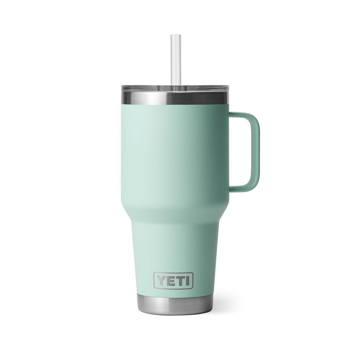 YETI Rambler 35 oz with handle in seafoam, close-up showing sturdy grip for outdoor use.