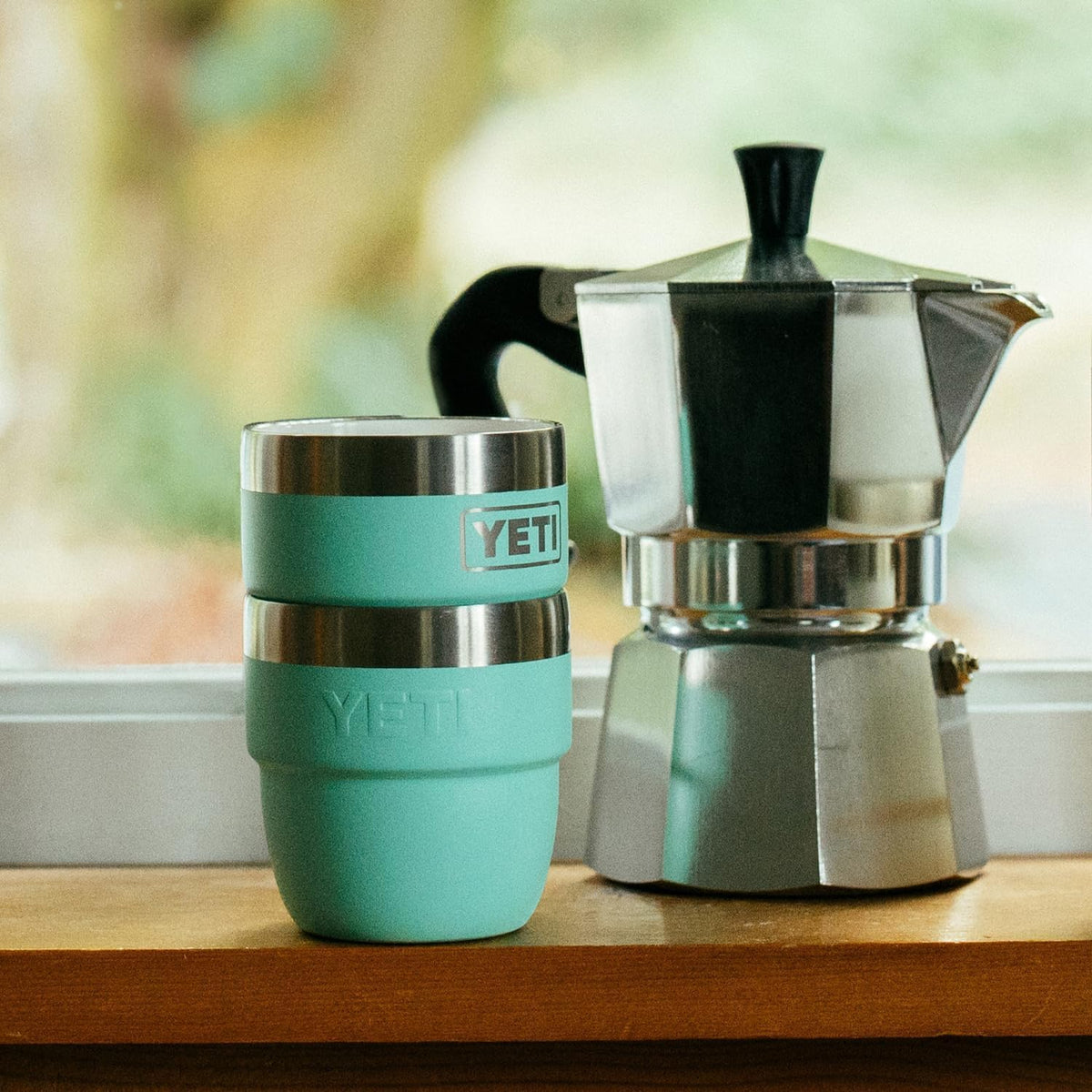 YETI Rambler 4oz cup in camp kit setup for travel coffee.