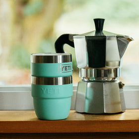YETI Rambler 4oz cup in camp kit setup for travel coffee.