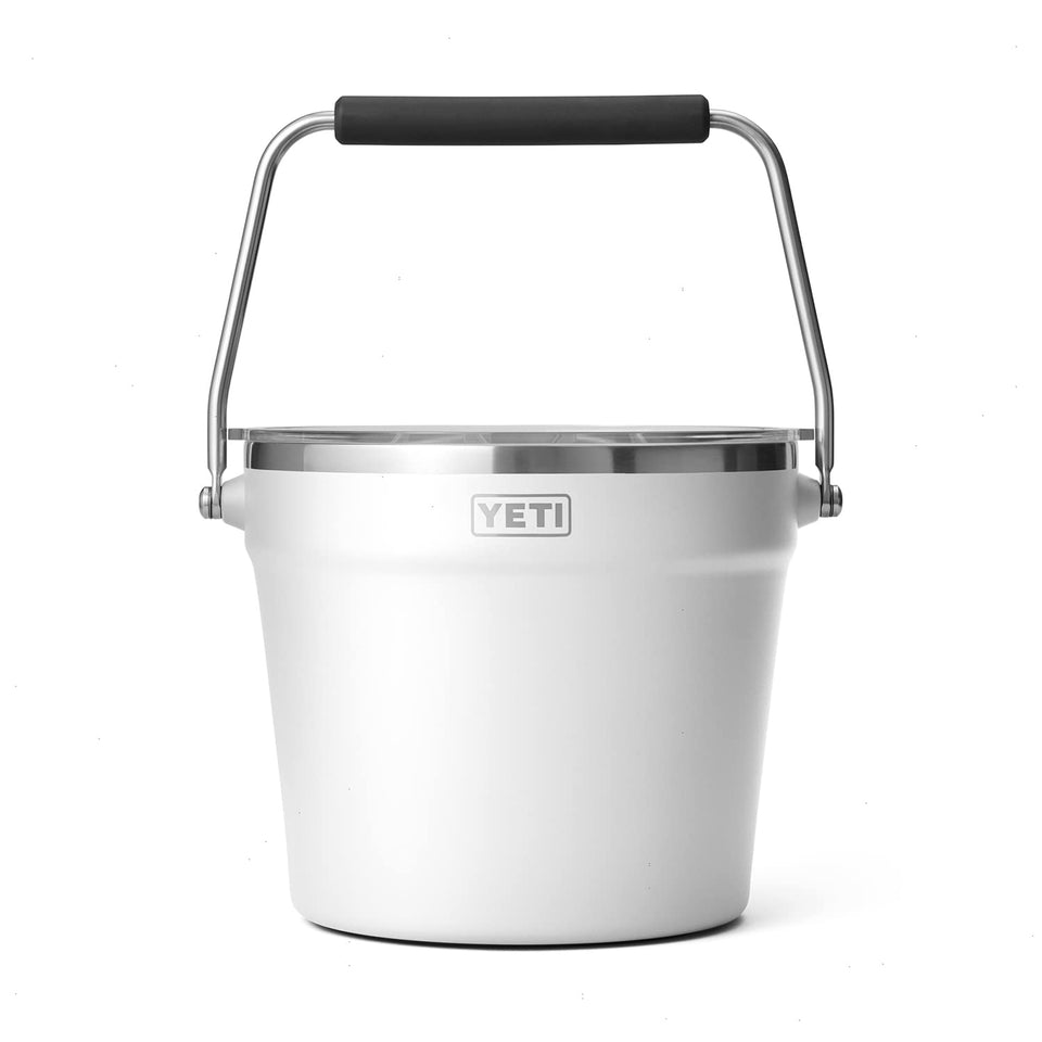 YETI Rambler Beverage Bucket with lid on white surface, ready to chill.