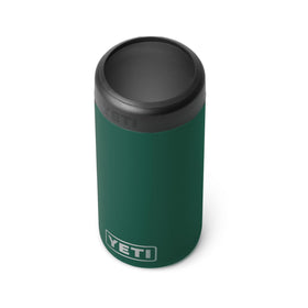 YETI Slim Colster 12oz green holding a cold can at the beach