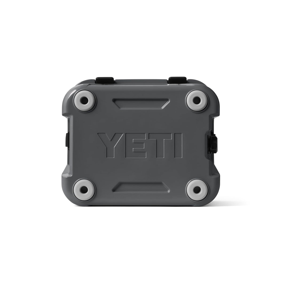 YETI Roadie 24 2.0 charcoal in-use at a tailgate
