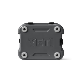 YETI Roadie 24 2.0 charcoal in-use at a tailgate
