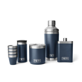 Shot glasses stacked inside the case save space during travel