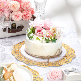 Yexiya gold lace doilies decorate wedding table settings.
