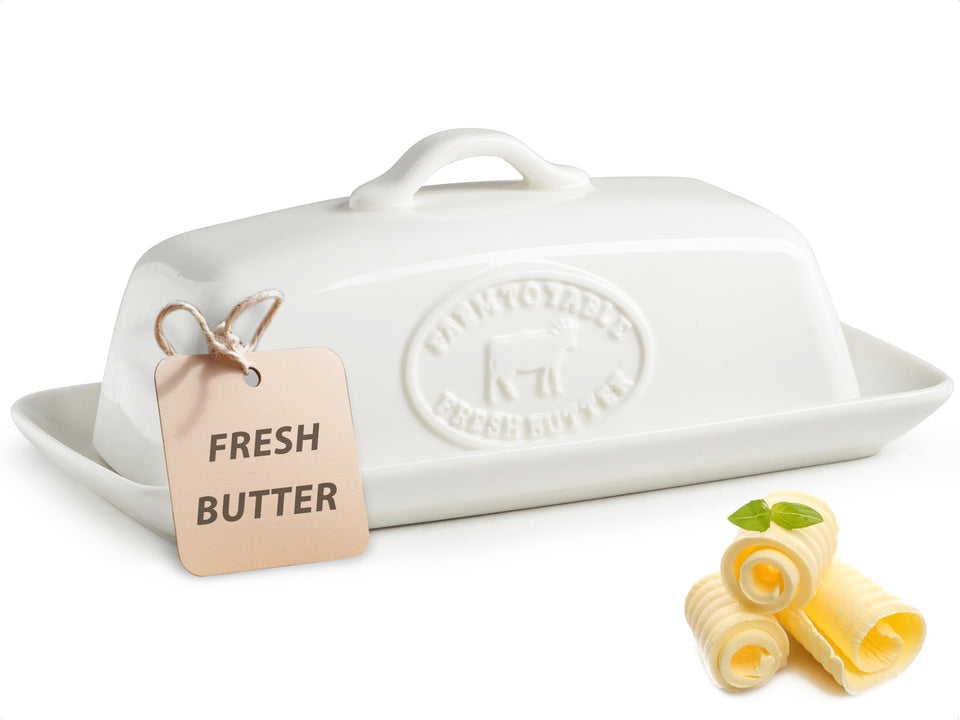 YHOJOY cow butter dish with lid in white ceramic keeps butter fresh and accessible.