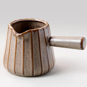 YHOJOY espresso cup with handle, ergonomic grip for steady pouring.