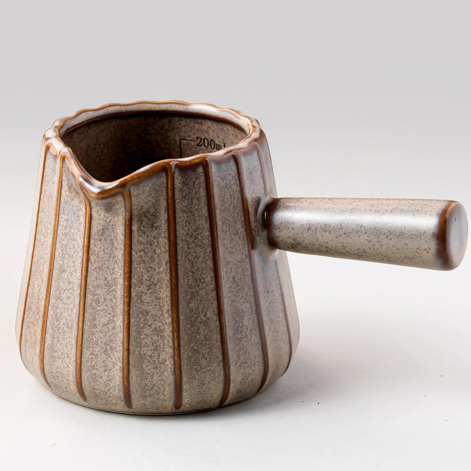 YHOJOY espresso cup with handle, ergonomic grip for steady pouring.