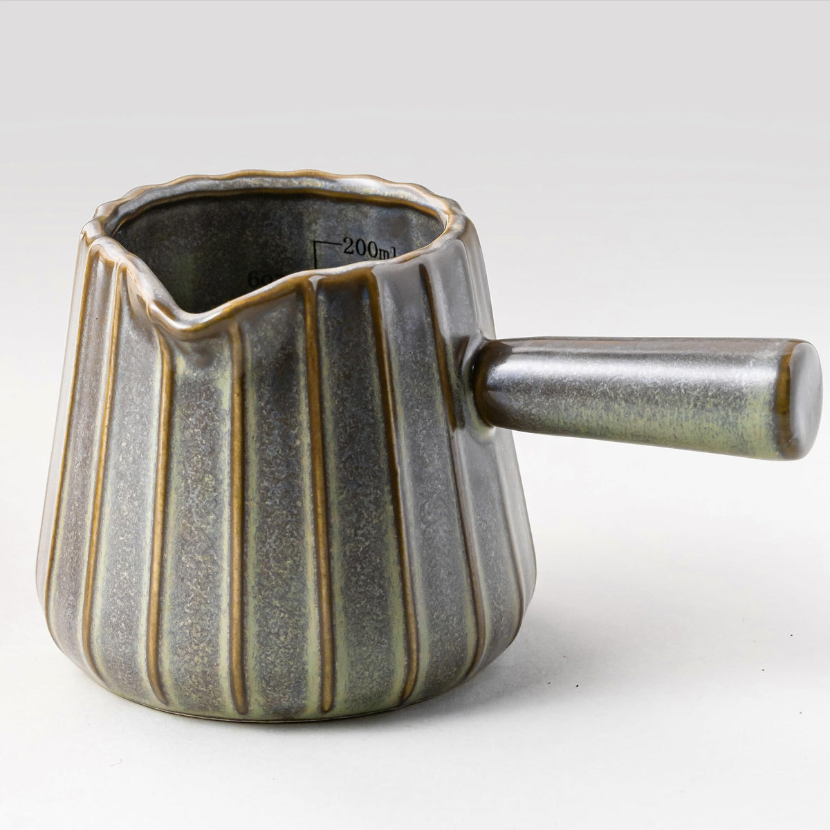 YHOJOY ceramic espresso cup front view with dual measurement scales for precision
