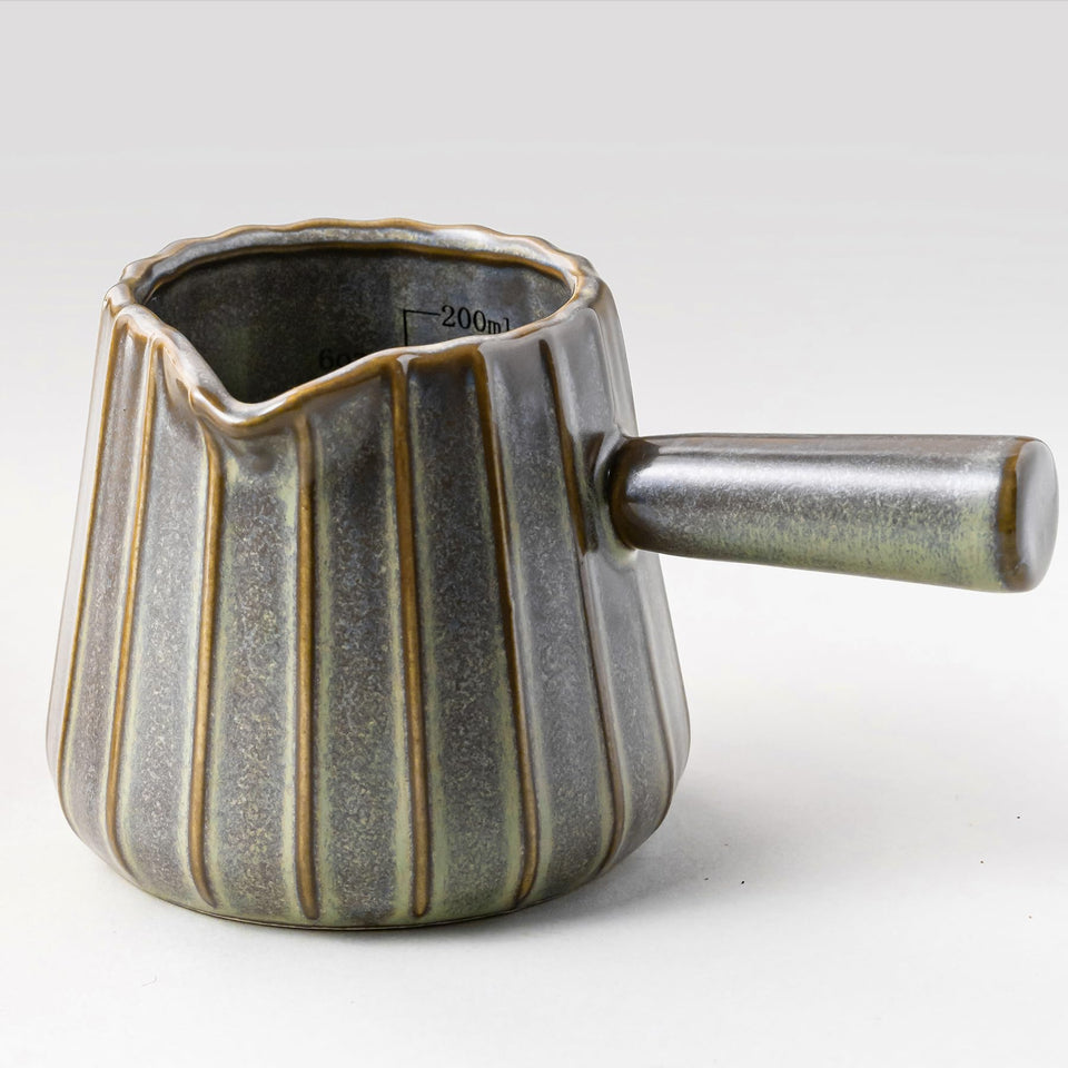 YHOJOY ceramic espresso cup front view with dual measurement scales for precision