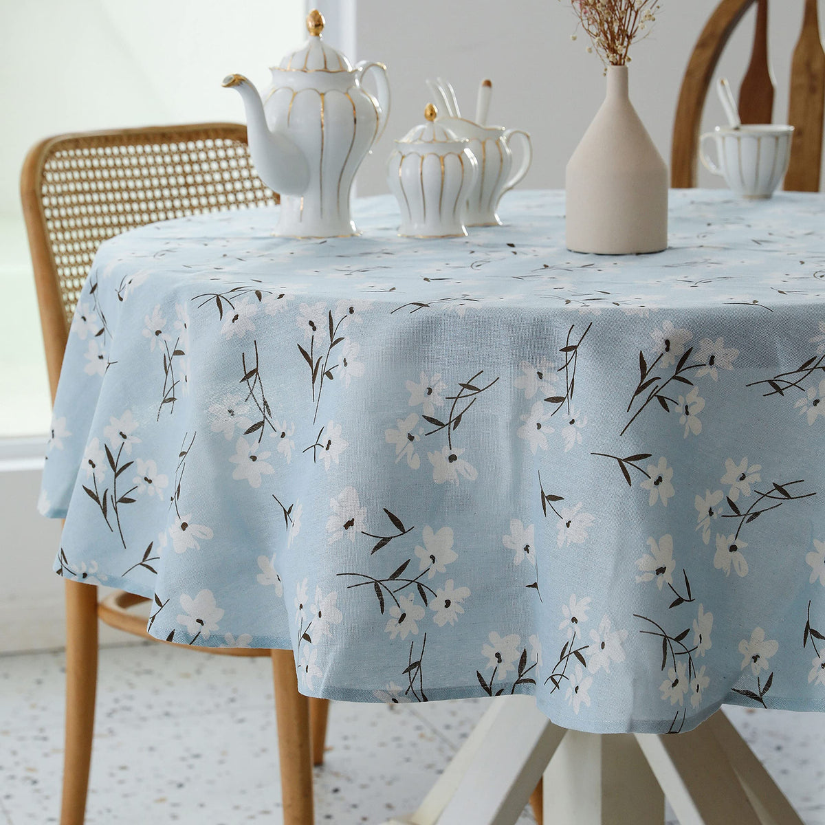 YiHomer Pastoral Round Tablecloth with floral light blue pattern protects tables during casual dining