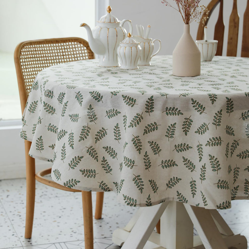 YiHomer Pastoral round tablecloth with 60-inch diameter protects the table while adding a refined look.