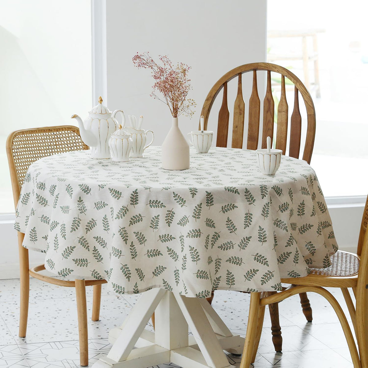 YiHomer Pastoral tablecloth shows green leaf design brightening indoor or outdoor dining.