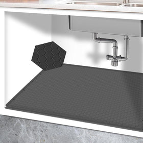 YIJUANGFA silicone under-sink mat with 0.7in edge barrier protects cabinets from leaks.
