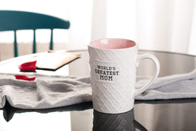 Ynsfree ceramic mug with geometric relief outer texture adds tactile appeal.