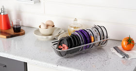 Yoku Made lid organizer keeps lids neat and accessible on shelves.