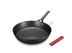 Yonida carbon steel pan 10-inch showing seasoned surface for easy release and browning