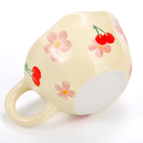 Yopay handcrafted mug with irregular shape adds charm to cocoa moments